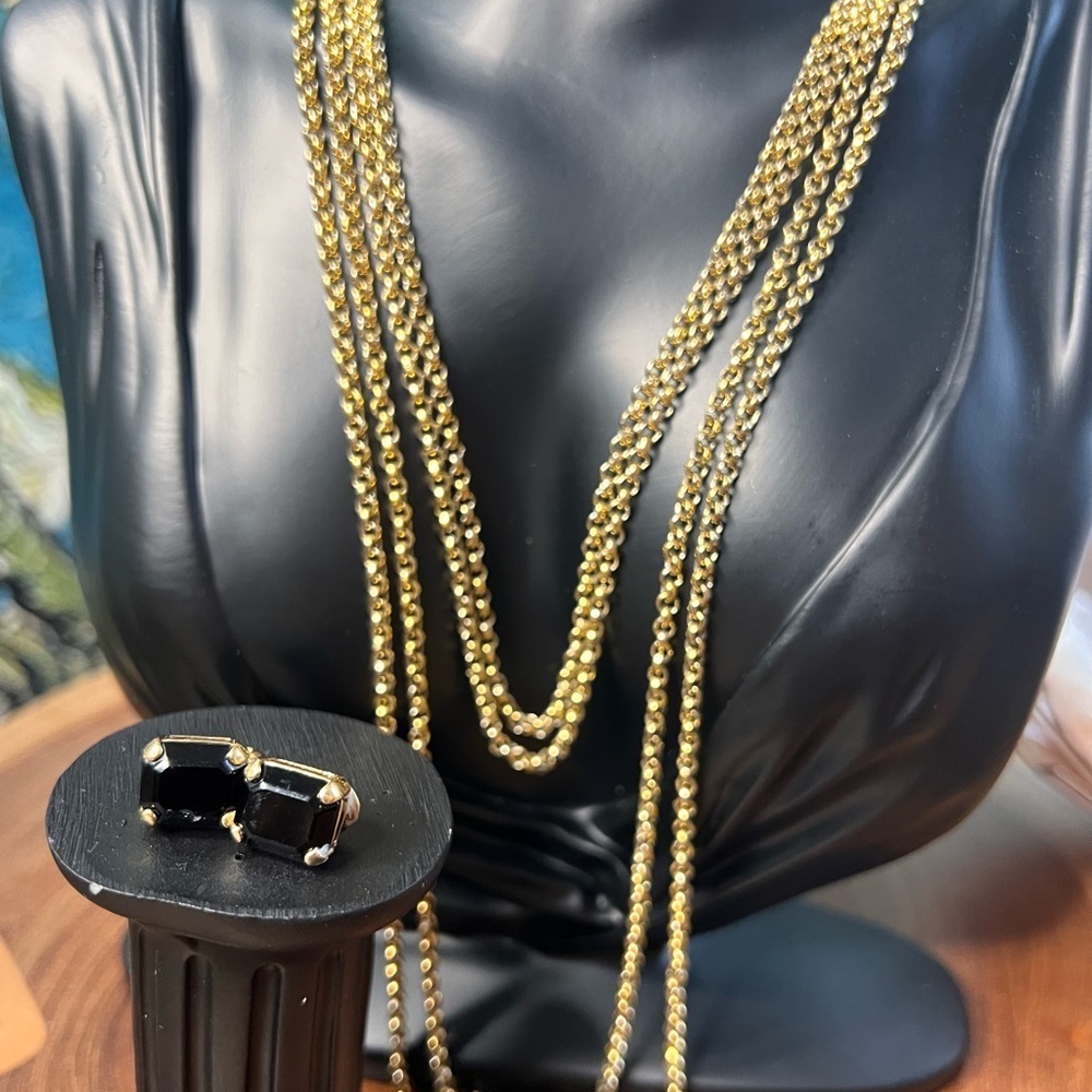 Matching 45 inch gold chain necklace with black onyx clip on earrings.